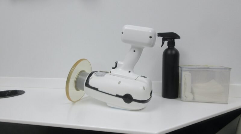 X-Ray gun. Last time I had dental x-rays they still had the big heavy machinery attached to the ceiling that had to be maneuvered around. Now the tech