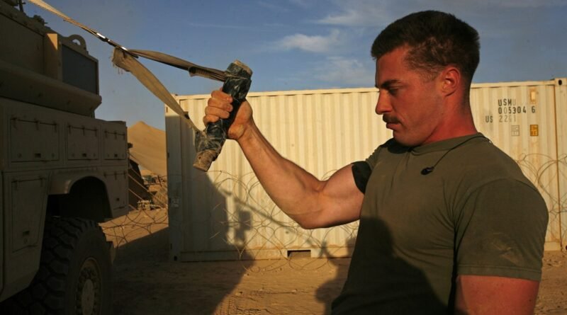 1st Lt. William G. Goodwin, an executive officer for mobility assault company, 2nd Combat Engineer Battalion, uses his home made physical fitness equi