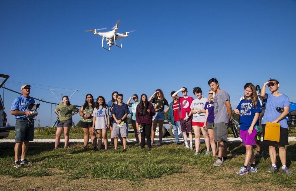 UAV — Larry Purcell, Distinguished Professor of crop physiology for the Arkansas Agricultural Experiment Station, demonstrates the use of drone remote